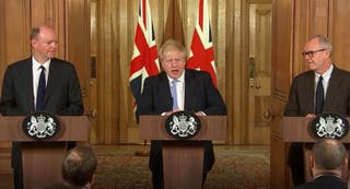 Former Prime Minister Boris Johnson (centre) speaks with England's Chief Medical Officer Chris Whitty (left) and Chief Scientific Adviser Sir Patrick Vallance (right) at a press conference at 10 Downing Street in March 2020.